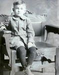 Box 41, Neg. No. 53149: Boy Sitting on a Chair