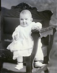 Box 41, Neg. No. 53217:  Baby Sitting on a Chair