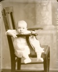 Box 41, Neg. No. 53973B: Baby Sitting on a Chair
