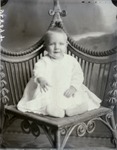 Box 41, Neg. No. 52809: Baby Sitting on a Chair