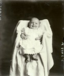 Box 42, Neg. No. 53401: Baby Lying on a Chair