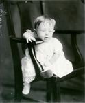 Box 42, Neg. No. 53408: Baby Sitting on a Chair