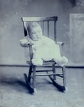 Box 42, Neg. No. 52615: Baby in a Rocking Chair