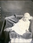 Box 43, Neg. No. 52729:  Baby Sitting on a Chair