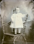 Box 43, Neg. No. 52473: Child Standing on a Chair