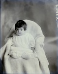 Box 43, Neg. No. 52465:  Baby Sitting on a Chair
