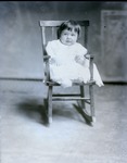Box 43, Neg. No. 52711: Baby in a Rocking Chair