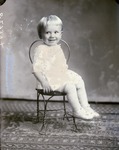 Box 43, Neg. No. 52739: Boy Sitting on a Chair