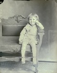Box 44, Neg. No. 52645: Boy Sitting in a Chair