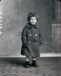 Box 44, Neg. No. 52335: Boy Standing in a Coat