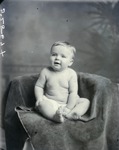 Box 44, Neg. No. 52869: Baby Sitting on a Chair