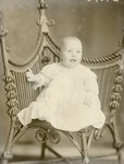 Box 44, Neg. No. 39068-R: Baby Sitting on a Chair