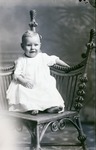 Box 45, Neg. No. 39117: Baby Sitting on a Chair