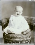 Box 45, Neg. No. 39189: Baby Sitting on a Chair