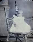 Box 45, Neg. No. 39083: Baby Sitting on a Chair