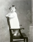 Box 45, Neg. No. 54499B: Baby Standing on a Chair