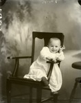 Box 46, Neg. No. 52020X: Baby Sitting on a Chair