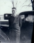 Box 48, Neg. No. 78064A: Photograph of a Man and a Car