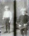 Box 52, Neg. No. 40313: Photograph of Boy in Two Poses