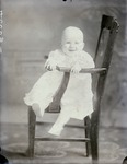 Box 53, Neg. No. 40008: Baby Sitting Sideways