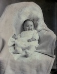 Box 55, Neg. No. 58734-A: Baby Lying on a Blanket