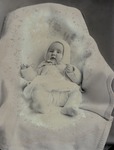 Box 55, Neg. No. 58734-RB: Baby Lying on a Blanket