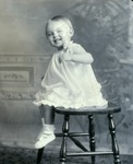 Box 55, Neg. No. 58786B: Girl Sitting on a Stool