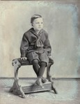 Box 56, Neg. No. 51661: Boy Sitting on a Bench