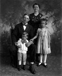 Box  11, Neg. No. Unknown: Man and Woman with Two Children