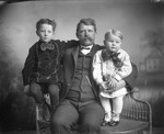 Box 12, Neg. No. Unknown: Man with Two Children by William R. Gray
