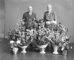 Box  13, Neg. No. Unknown: Man and Woman with Flowers