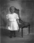 Box  13, Neg. No. Unknown: Girl Standing by Chair