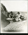 030-03: 15-21 George Applies Sealant to Fossils by George Fryer Sternberg 1883-1969
