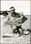 047-03: George Sternberg Holds an Albertosaurus Jaw by George Fryer Sternberg 1883-1969