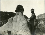 051-02: George Sternberg Standing at a Mushroom Rock by George Fryer Sternberg 1883-1969