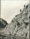 052-01: Men Prospecting Badlands Outcrop by George Fryer Sternberg 1883-1969