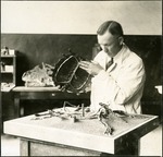 063-03: George Sternberg Affixing the Shell on a Turtle Fossil by George Fryer Sternberg 1883-1969