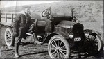 106-03: George Sternberg with the Expedition Truck by George Fryer Sternberg 1883-1969
