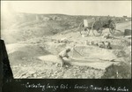 023_03: 28-26 Collecting Large Fossil in Two Frames by George Fryer Sternberg 1883-1969
