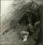 030_03: Two Men Working on Excavating a Fossil by George Fryer Sternberg 1883-1969