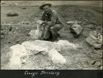 009_02: George Sternberg Processing a Skeleton in the Field by George Fryer Sternberg 1883-1969