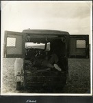 051_04: George F. Sternberg Sleeping in his Truck by George Fryer Sternberg 1883-1969