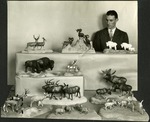 081_02: William Eastman with Models of Animals by George Fryer Sternberg 1883-1969