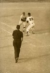 1960s Fort Hays State University Baseball Player Tagging Out Opponent by Fort Hays State University Athletics