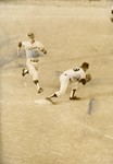 Late 1960s Baseball Player Running to Base by Fort Hays State University Athletics