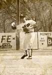 Late 1960s Baseball Player Throwing Ball Back by Fort Hays State University Athletics