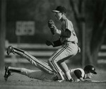 Baseball Player Sliding into Base and Catching Baseball by Fort Hays State University Athletics