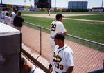 1998 Fort Hays State University Baseball Players Standing Along Fence by Fort Hays State University Athletics