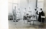 Postcard: A Nun, Two Men and Three Women Standing in an Operating Room