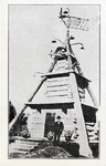 Postcard: S. P. Dinsmoor Standing in Front of a Mausoleum in Garden of Eden